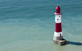 Red white lighthouse ocean pier - andries stock free wallpaper for desktop