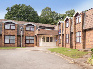 Building parking lot street sign - front of it free wallpaper