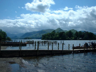 Docked people mountains clouds lake - lake free wallpaper