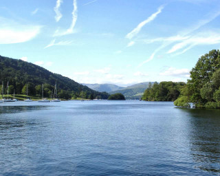 Lake mountain boats trees bridge - a few boat free wallpaper