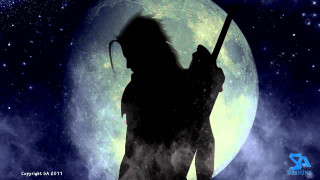 Man holding staff full moon - a full moon behind free wallpaper