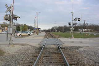 Traintrack car stoplight day sky - the other side of it free wallpaper