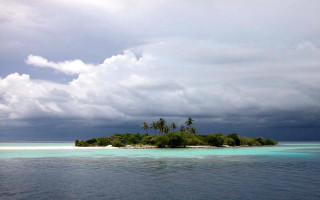 Small island cloudy sky palm - stormy weather free wallpaper