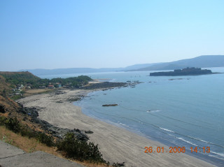 Beach water hill boat distance 2 - free beach wallpaper