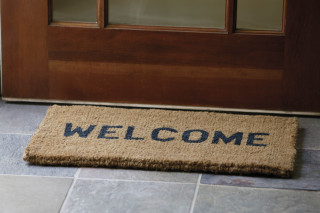 Welcome mat intricate detail no - the floor of a house free wallpaper