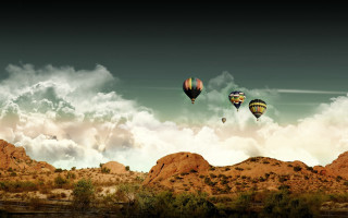 Hot air balloons mountain range 2 - over a mountain range in the sky free wallpaper