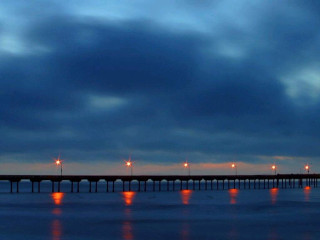 Pier lights night cloudy sky 2 - a pier free wallpaper for desktop