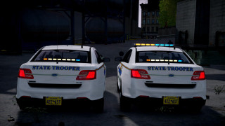 Two white police cars nighttime - a street free wallpaper