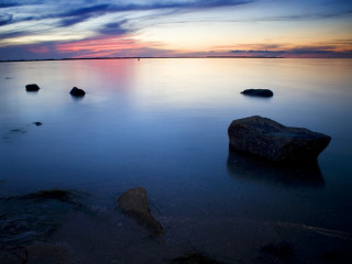 Sunset water rocks clouds sky 3 - the foreground and a sky free wallpaper