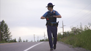 Police officer running road gun - a police officer free wallpaper