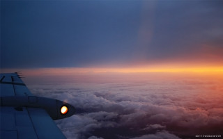 Plane wing sunset clouds light 2 - atmospheric free wallpaper