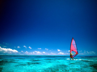 Sail board riding person water - a person riding free wallpaper