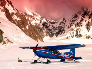 Blue airplane snowfield mountains orange - field next free wallpaper