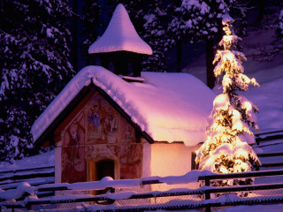 Small church lit tree snow - magical atmosphere free wallpaper