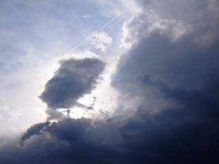 Plane cloudy sky contrail distant - stormy weather free wallpaper for desktop