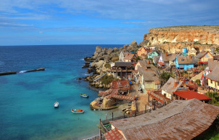 Village shore water boat cliff - free spring wallpaper for desktop