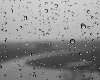 Window rain drops plane background - ambient free wallpaper