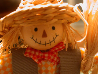 Scarecrow doll strawhat redbow tie 2 - a straw hat free wallpaper