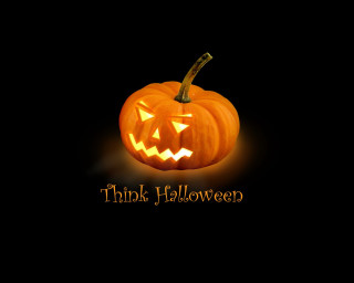Glowing pumpkin jack o lantern 2 - side and the words free wallpaper