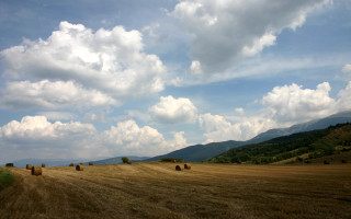 Hay field mountains clouds sky - landscape free wallpaper for desktop
