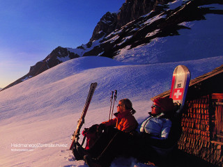 Two people bench skis snow 3 - their foot free wallpaper