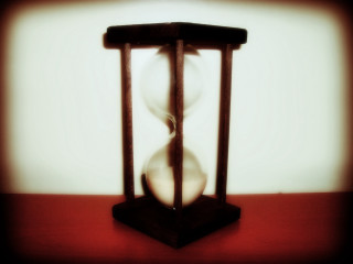 Hourglass person face red table - underneath free wallpaper