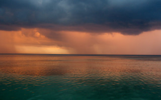 Storm ocean boat dark clouds - a dark cloud in the sky free wallpaper