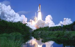 Space shuttle takeoff river clouds - a space shuttle free wallpaper for desktop