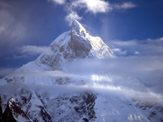 Snowy mountain cloudy sky sunbeam 3 - a mountain free wallpaper