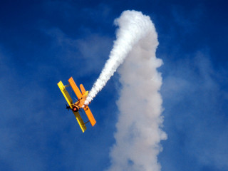 Plane flying sky smoke trail - back end free wallpaper