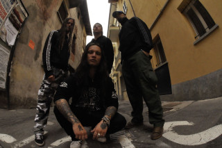 Men sitting alleyway building long - a group of men free wallpaper for desktop