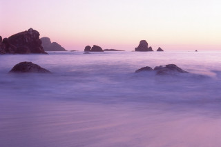 Beach rocks water pink sky 2 - a few wave free wallpaper