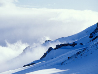 Skiing clouds mountain person foreground - a mountain free wallpaper for desktop