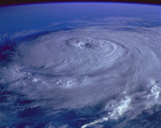 Satellite view hurricane ocean space - a white circle free wallpaper