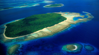 Island ocean water land surrounding 2 - an island in the middle of the ocean free wallpaper