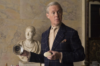 Man suit holding object statue - a man in a suit holding free wallpaper