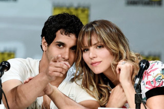 Man woman sitting table microphones - a man and a woman sitting next free wallpaper