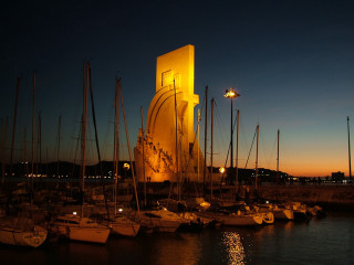 Boats night cityscape almada negreiros - a bunch of boats free wallpaper