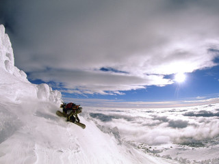Man snowboard slope cloudy sky 2 - a snowboard free wallpaper