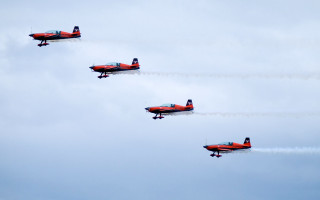 Four airplanes flying formation smoke 3 - the back of them free wallpaper