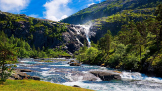 Waterfall river trees grass rocks - a waterfall in the middle of it free wallpaper