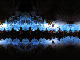 Cave water reflection building background - the water and a building in the background free wallpaper