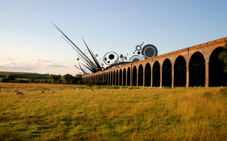 Brick bridge animals grass sky - the grass below free wallpaper