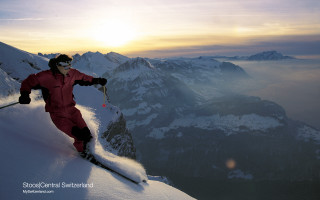 Man red snow suit skiing 3 - fabien charuau free wallpaper