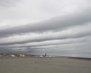 Kite beach cloudy lighthouse person - a kite free wallpaper