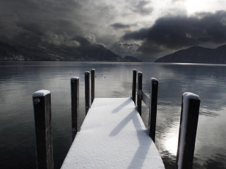 Snow covered dock lake mountains 4 - dark cloud free wallpaper