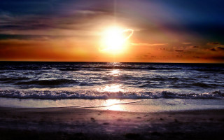 Sunset ocean bright sun wave 2 - a sunset over the ocean free wallpaper