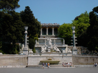 Fountain statues people park trees - a fountain free wallpaper