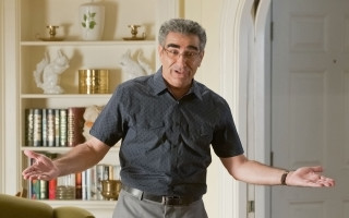 Man living room arms outstretched - verdadism free wallpaper