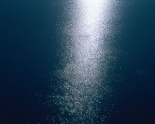 Boat floating water beach sunshine - a bright sun free wallpaper